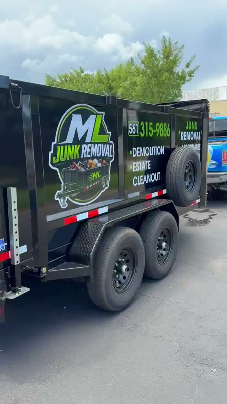 ML Junk Removal dump trailer, driver side